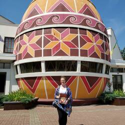 Brooke with her new book outside of the massive pysanka