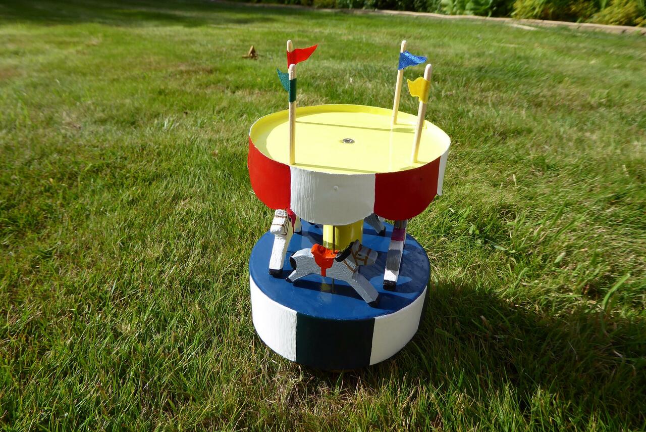 Finlay's present - carousel that turns and plays happy birthday