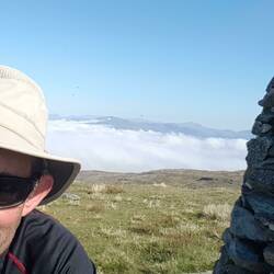 Moel Ysgyfanogod trig point (CP28) with low coastal cloud in the background