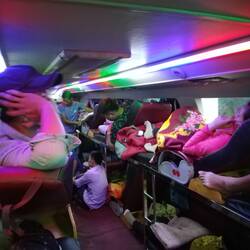 In the fancy but not so comfortable bus. At every stop, more and more people were coming to sleep in the cente
