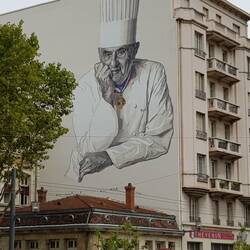 Paul Bocuse, painted on a wall opposite Les Halles.