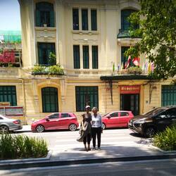 With my mum in front of the building