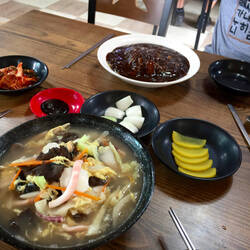 Brunch. Two Noodle Dishes, One with Bean Paste/Sauce, the Other with Seafood