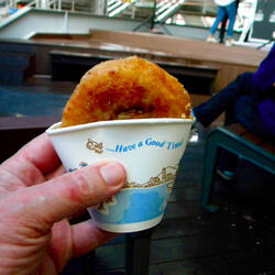 Hotteok, a Snack Made of a Fried Small Puffy Pancake, Stuffed with Nuts and Seeds