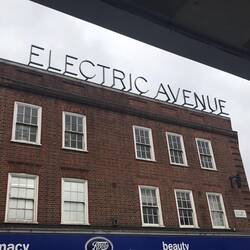 As the name states - Electric Avenue - it was the first market street to be lit by electricty
