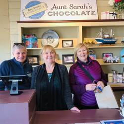 Heather and I posing with the shop clerk at Aunt Sarah's Chocolate Shop