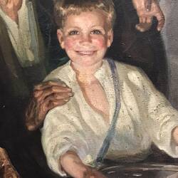 Zoomed in on the smiling boy as friends often tease Ian about not smiling in photos