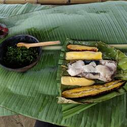Fish, yucca & banana, grilled in the banana leaf