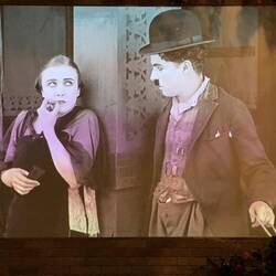 Charlie Chaplin in his most famous role as "The Tramp"