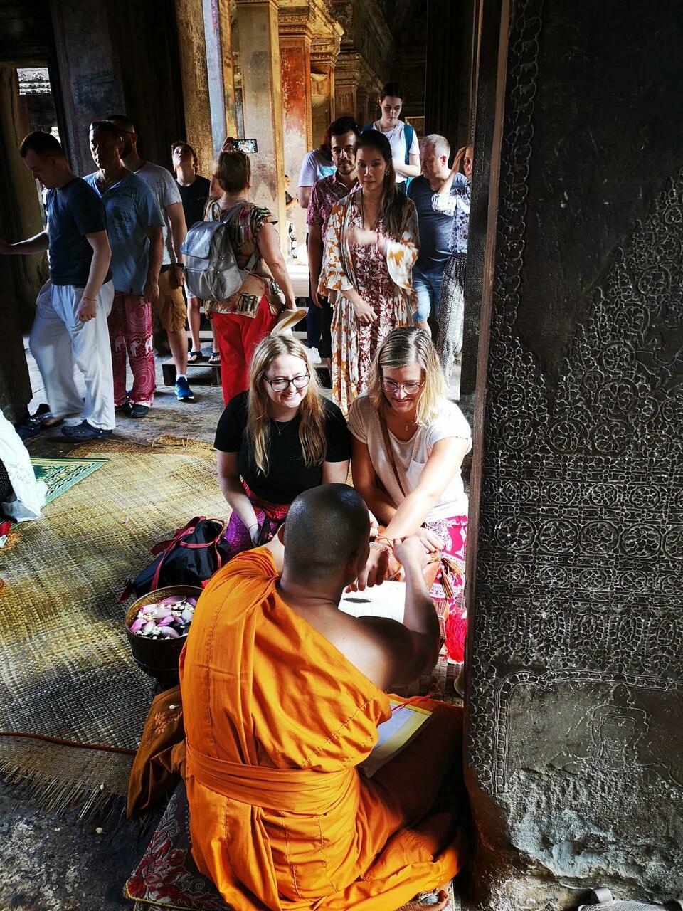 Stephanie and Lucy receiving a blessing