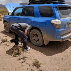 Reducing the air in the tires to make the rocky ride a little smoother and faster