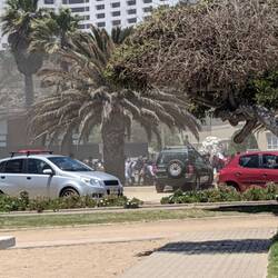 Protest march that blocks traffic, forcing cars to move at a snail's pace.