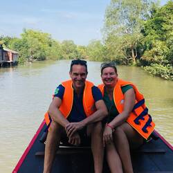 Bending into one of the side rivers of Hau, heading into an eco-agricultural fruit garden