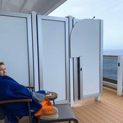 Aylin all bundled up on a sea day sailing the North Atlantic.