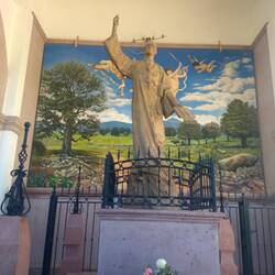 A statue of Mascota's priest who became a saint.