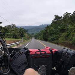 Hitchbiking at the back of John Taylor's truck