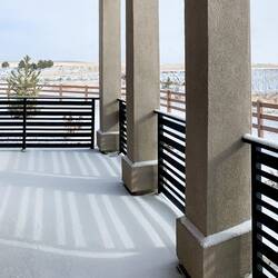 Our patio and a glimpse of the arroyo — Colorado Springs, CO.