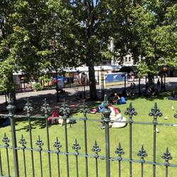 The main square in Dunedin welcomes guests on a warm February day