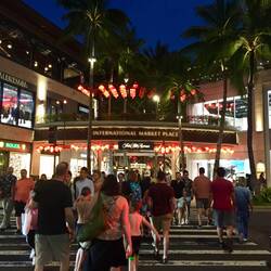 Waikiki is busy day and night. Nearly 10 million people visit Hawaii annually.