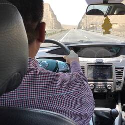 Rocks carved out in a V for the highway.