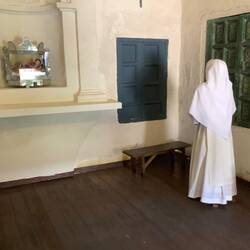 Nun's costume displayed at convent.