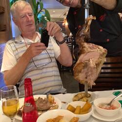 Carving meat from a sword.