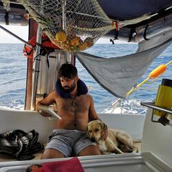 Alejandro and Wilson watching the cockpit