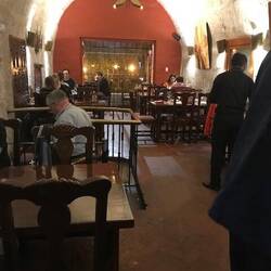 Mike heading down wrought iron circular stair case.