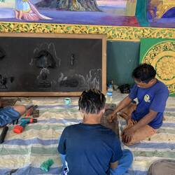 Crafters creating decorations for tge temple