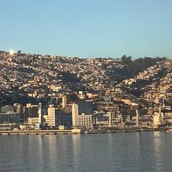 Approaching a sun bathed Valparaiso.