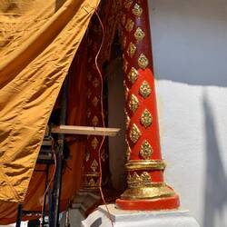 Renovation. Hand applying gold leaf paint