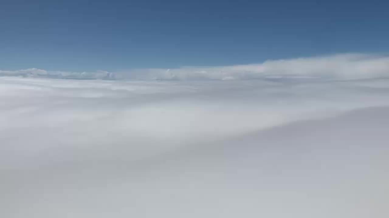 Through the clouds we go — Aboard UA652.