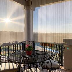 We installed solar shades made locally in Denver to cut down on the glare from the morning sun.