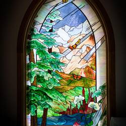 Nature-inspired window at the Redstone Church — Redstone, Colorado.