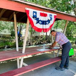 No need to take out our own picnic table ... this one provides much needed shade — Cedaredge, CO.