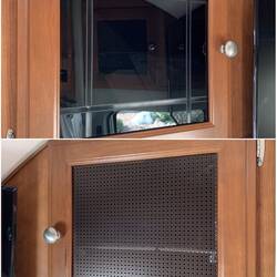 The driver-side cabinet still has the original glass; the other one now sports a mesh front.