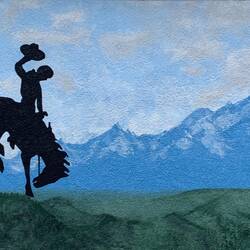 Steamboat, the model for the bucking horse and rider motif, was stabled in Wheatland, WY.