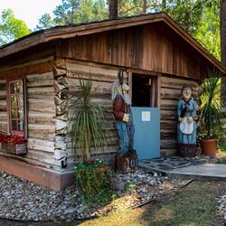 Ole & Lena welcome visitors to the museum at the stavkirke ... Chapel in the Hills — Rapid City, SD.