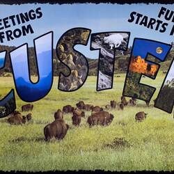 The "fake" mural is actually an oversized print banner — Custer, SD.