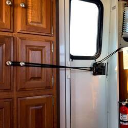 Bungy cords for added security until we can replace the latch bolt that broke a few days ago.