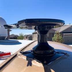 Step 5: Screw down the new antenna to the roof. Just need some leveling compound to finish the job.