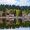 A "double the pleasure" reflection of the lodge and facilities on Grace Lake — Farish Rec Area, CO.