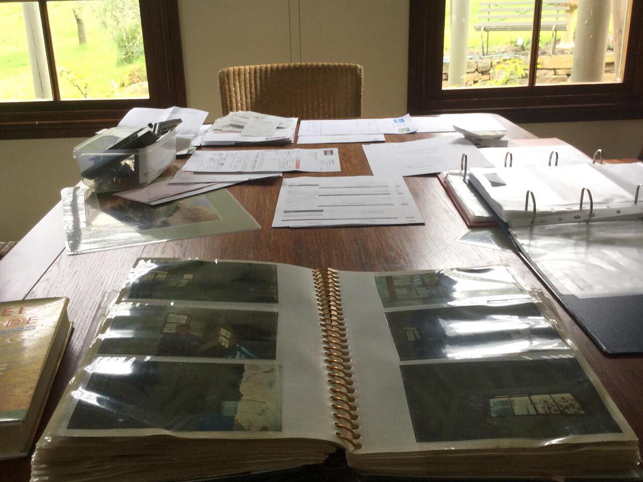 GST papers and photo album of the house build.