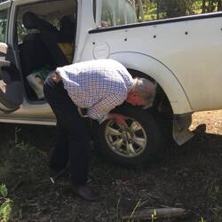 Tightening up the wheel nuts.