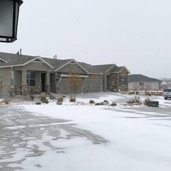 Most of the snow in the driveway was blown here by the winds — Colorado Springs, CO.