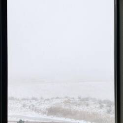 View of the arroyo and the plains from the stairwell — Colorado Springs, CO.