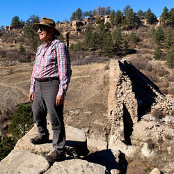 What's left of Castlewood Dam ... Mui's standing on part of it — Castlewood Canyon SP, CO.