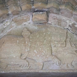 Centaur hunting a lion ... above the north entrance to Cormac's Chapel — Rock of Cashel, Ireland.