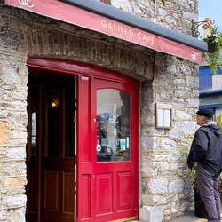 Mui perusing the menu @ Galileo Café — Cahir, Ireland.