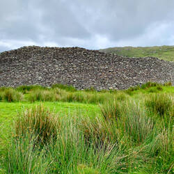 First glimpse of the ruins of the Staigue Stone Fort as we walk up the path — Ireland.